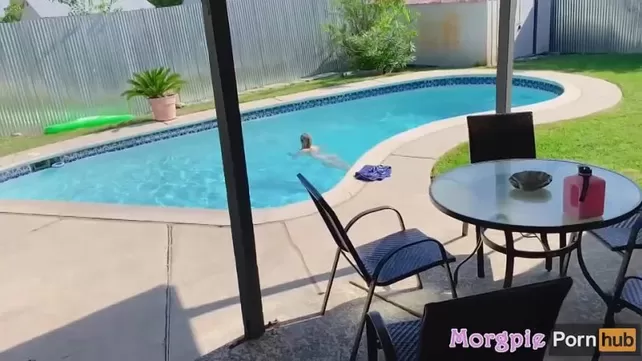 Hot couple having sex in the pool